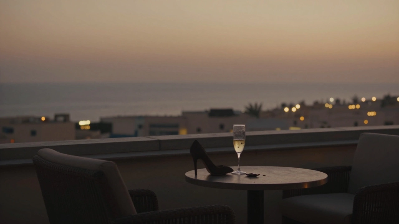 Empty rooftop lounge with a single high heel and champagne glass overlooking Dubai at sunset.